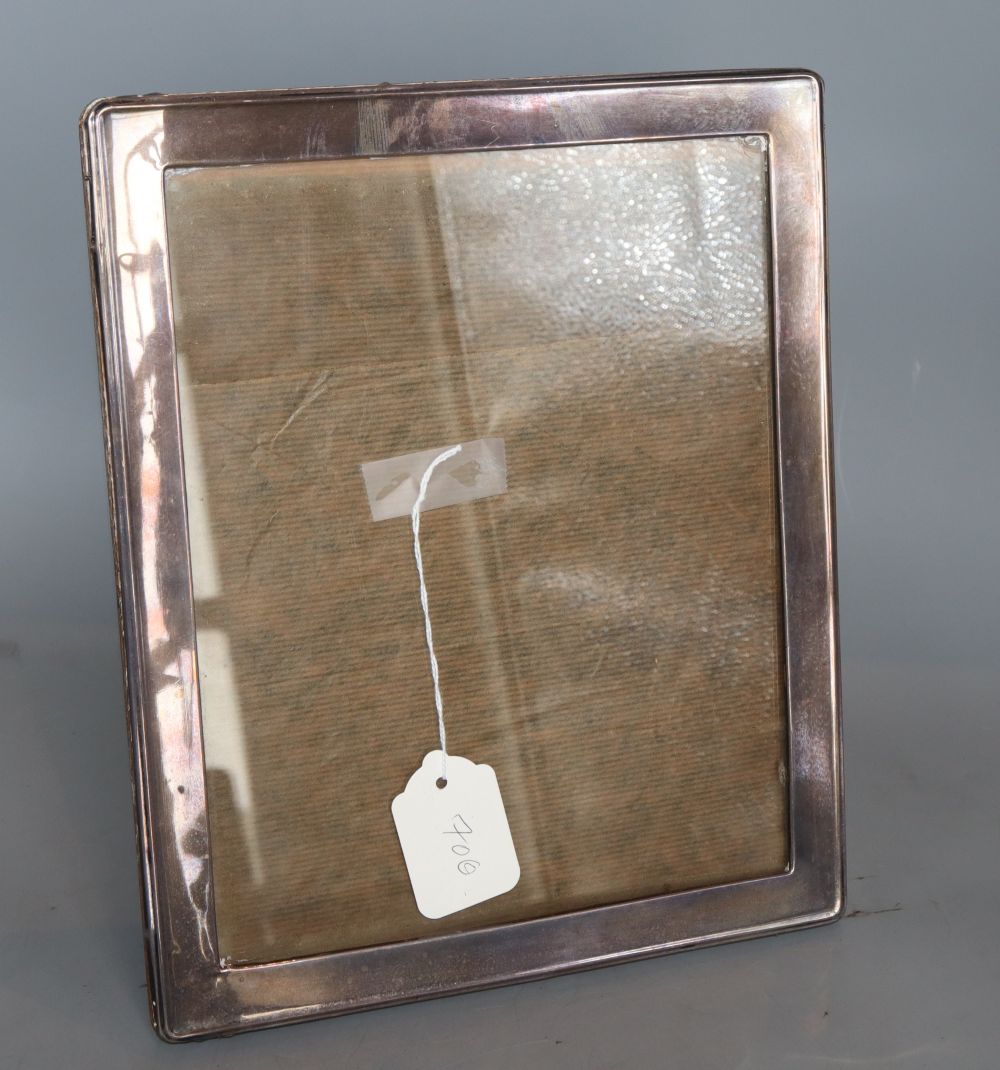 A George V silver mounted rectangular photograph frame, Birmingham, 1921, 21.8cm.